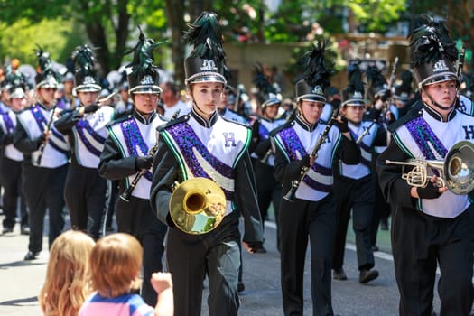 Portland, Oregon, USA - JUNE 7, 2014: Heritage High School Marching Band in Grand floral parade through Portland downtown.