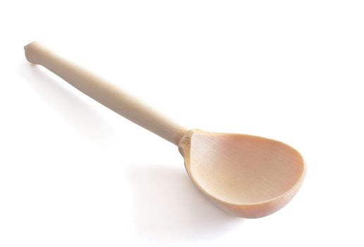 simple wooden spoon from linden wood on white background