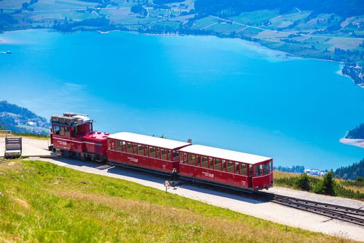 ST. WOLFGANG, AUSTRIA - AUGUST 6: Diesel train railway going to Schafberg Peak (1783m) on August 6, 2013 in St. Wolfgang.