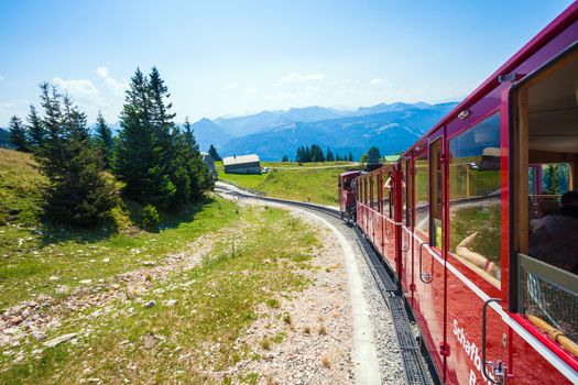 ST. WOLFGANG, AUSTRIA - AUGUST 6: Steam locomotive of a vintage cogwheel railway going to Schafberg Peak (1783m) on August 6, 2013 in St. Wolfgang.