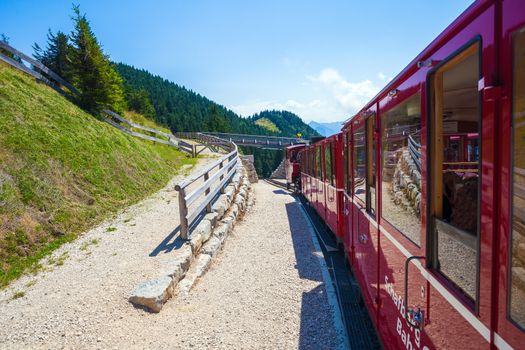 ST. WOLFGANG, AUSTRIA - AUGUST 6: Steam locomotive of a vintage cogwheel railway going to Schafberg Peak (1783m) on August 6, 2013 in St. Wolfgang.