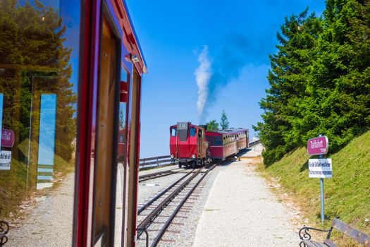 ST. WOLFGANG, AUSTRIA - AUGUST 6: Steam locomotive of a vintage cogwheel railway going to Schafberg Peak (1783m) on August 6, 2013 in St. Wolfgang.