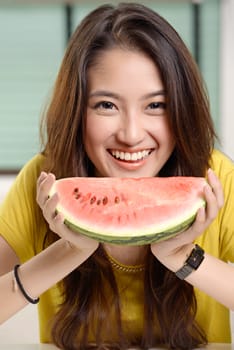 Young Asian cute woman and Eating watermelon