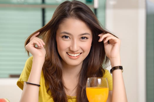 Asian young women cute woman drinking orange juice