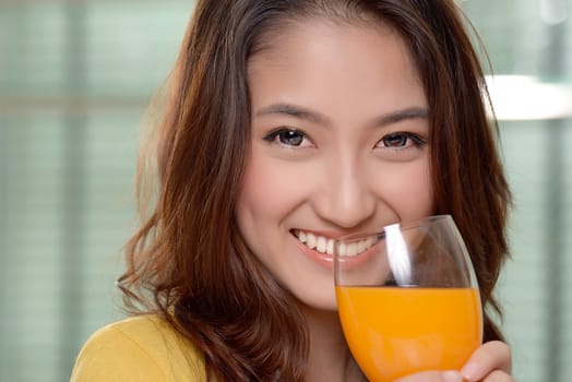 Asian young women cute woman drinking orange juice