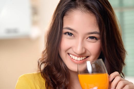 Asian young women cute woman drinking orange juice