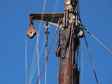 Pulley for sails and ropes made from wood on an old sail boat