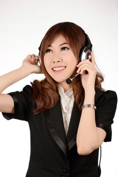 Portrait of a smiling happy business woman call center operator