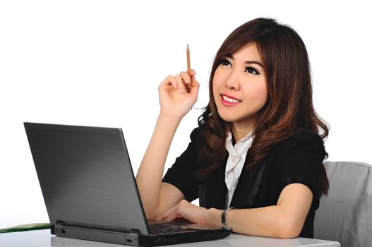 Young business woman working at office
