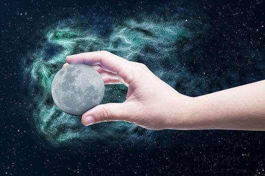 The moon in a hand