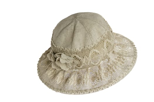 Female hat from a linen cloth and lacy fabric for protection against the sun. It is presented on a white background.