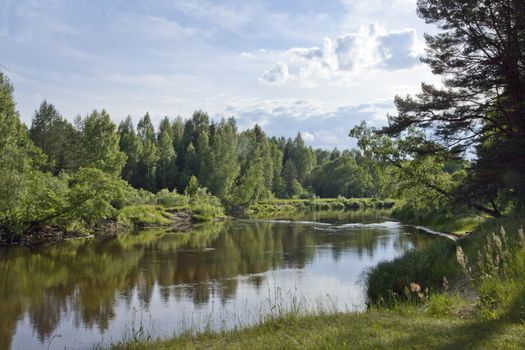 Summer landscape with river, forest and clouds