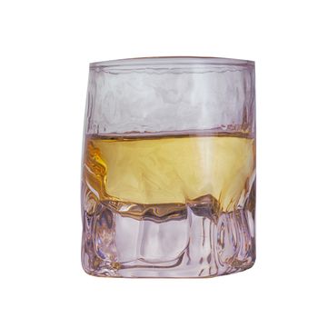 Small whisky glass isolated over white background