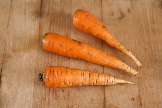 group of Carrots on wooden board