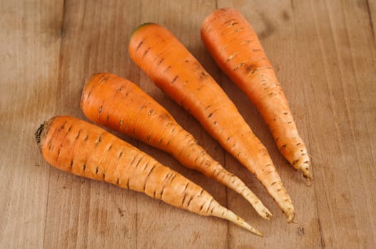 group of Carrots on wooden board