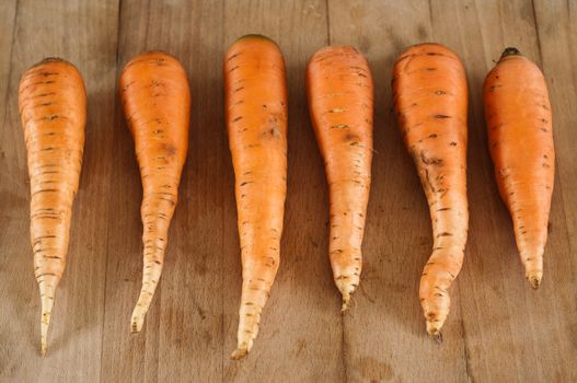 group of Carrots on wooden board