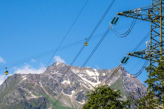 The wagoons of ski station and power lines Austria