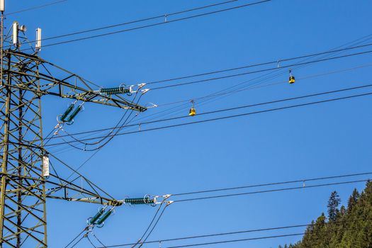 The wagoons of ski station and power lines Austria