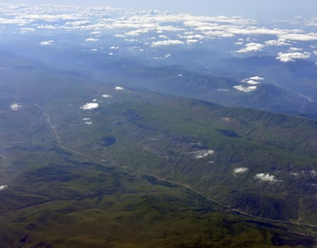 Mountains covered with trees. Top view. Natural landscape