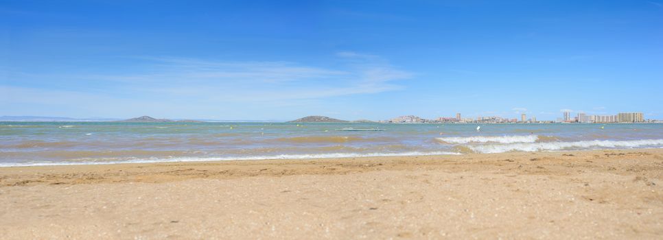 European sandy beach and blue sea, panoramic photo