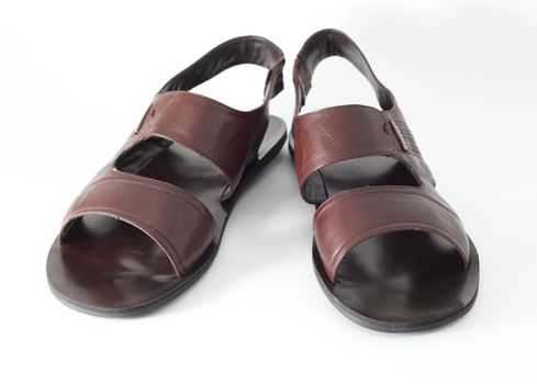 brown sandals on a white background