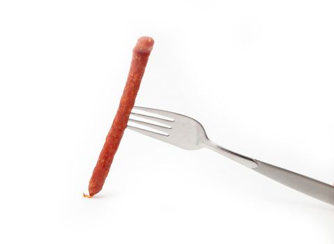 sausage on a fork isolated on white background