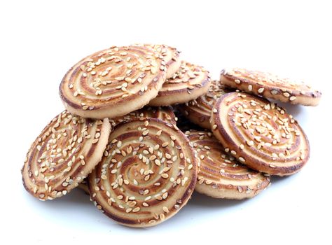 Sesame cookies on a white background