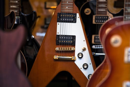 View of many guitars in the shop