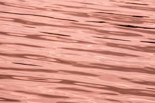 Water with pink highlights