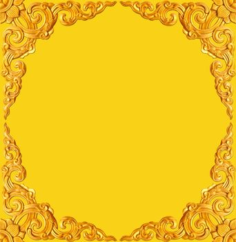 golden flower carve frame isolated on yellow background