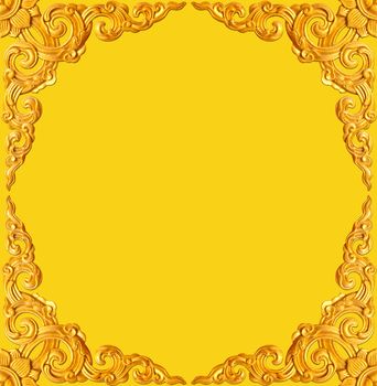 golden flower carve frame isolated on yellow background
