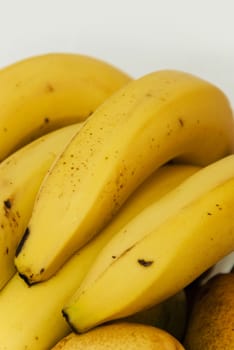 group of bananas closeup on white background