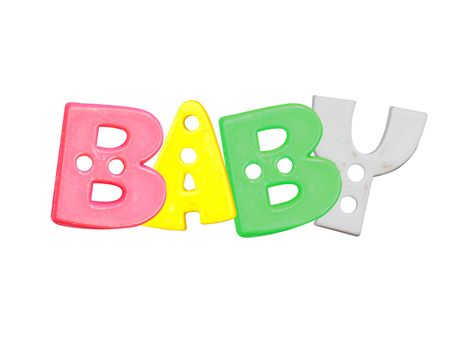 Alphabet baby plastic letters on a white background