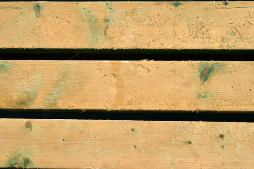 Painted wooden boards with nails. The orange color