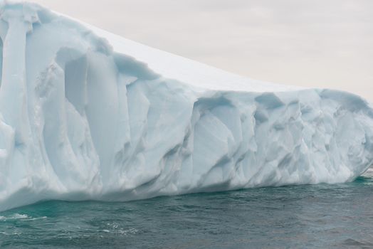 Detail of a beautiful iceberg in arctic waters around Disko Island in Greenland