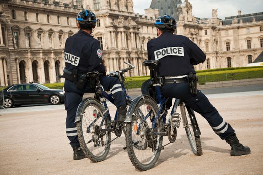 french policemen in bike in Paris