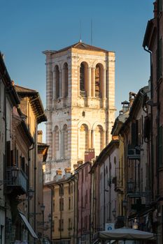 Bell tower of the Ferrara cathedral view from Mazzini street