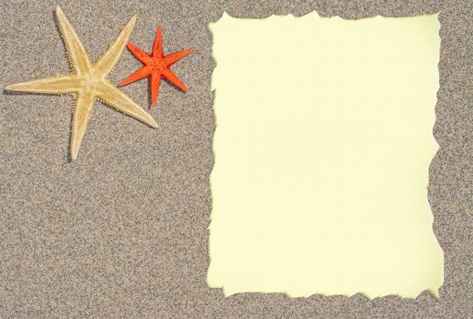 Starfish on sand with blank paper ,copy space and room a list menu or text 