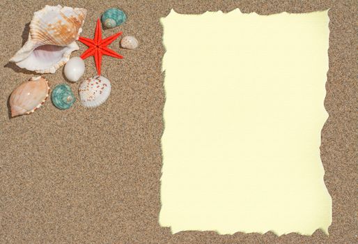 Starfish on sand with blank paper ,copy space and room a list menu or text 

