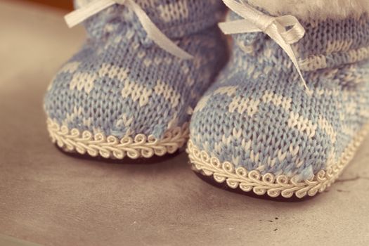 Winter boots in the snow. Christmas composition