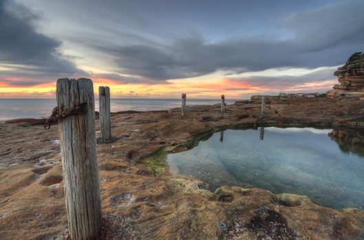 Sunrise and natural rock pool, South Coogee, East Sydney NSW, Australia
