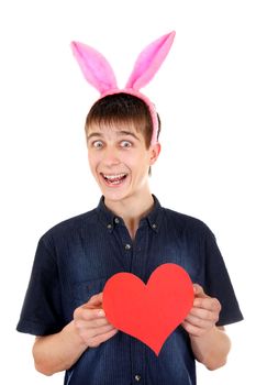 Funny Teenager with Bunny Ears and Red Heart Shape on the White Background