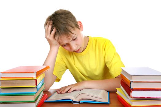 Tired Kid at the School Desk with a Books Isolated on the white background