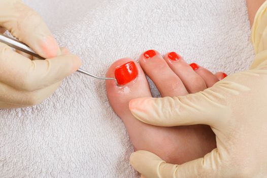 pedicure process macro closeup, cleaning of cuticle