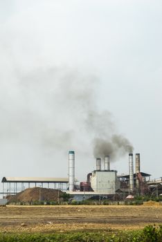 Chemical factory with smoke stack