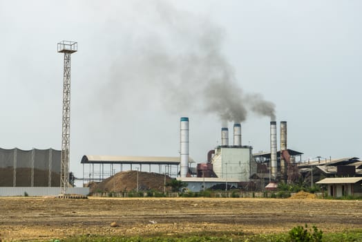 Chemical factory with smoke stack