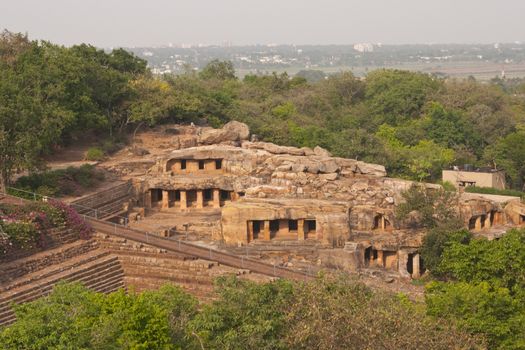 Jain cave temples carved out of the solid rock of the hillside at Bhubaneshwar, Orissa, India. 1st Century BC