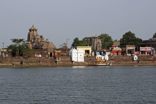 Ancient Hindu temples along the lake shore in Bhubaneswar, Orissa, India.