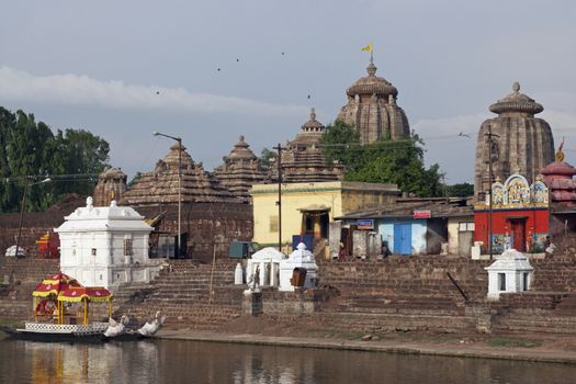 Ancient Hindu temples along the lake shore in Bhubaneswar, Orissa, India.
