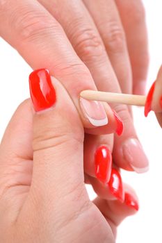 beauty salon, manicure applying, cleaning the cuticles